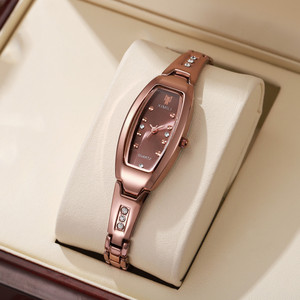 Le nouveau produit présente un design unique d'une montre pour femme en forme de tonneau Montre à quartz de luxe et à la mode pour dames - Product Image 1