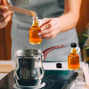 Tarros de jarabe de vidrio transparente de 3,4 oz con mango de bucle Tapas negras reutilizables de <span class=keywords><strong>100ml</strong></span> para salsa para jarabe de arce y Tequila - Product Image 4