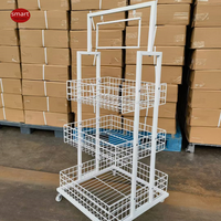 Présentoir mobile en métal thermolaqué avec panier en fil métallique pour promotion en magasin