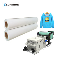 Film DTF en rouleau à décollement à chaud pour impression double face, idéal pour le transfert thermique sur T-shirts et vêtements – Vente en gros usine