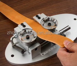 Machine manuelle artisanale pour la production de cuir, pour sacs, avec structure mécanique stable, pour le raffermissement et la découpe rapide des bords et des sangles - Product Image 1