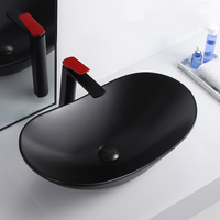 Lavabo en céramique noir mat de style moderne, lavabo de comptoir ovale, lavabo de salle de bain noir