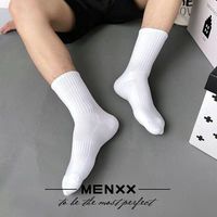 Chaussettes hautes unisexes pour adultes, en coton tricoté doux, couleur unie noir et blanc, avec logo discret, idéales pour le sport en automne, vente en gros