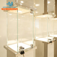 Vitrine de présentation de bijoux sur mesure verrouillable avec éclairage LED, présentoir de boutique de détail, pilier d'affichage OEM ODM pour vitrine