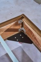 Cadre de lit pliable moderne en bois massif pour chambre d'hôtel avec sommier et mécanisme coulissant - Vente directe usine