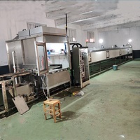Ligne de revêtement en poudre électrostatique contrôlée par PLC automatique avec four de cuisson et cabines de pulvérisation