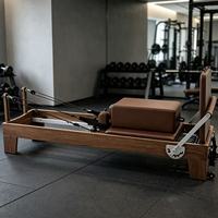 Ensemble complet de Pilates de luxe en noyer durable : Cadillac, Reformer, Wunda Chair, Ladder Barrel, Correcteur pour Studio de Pilates