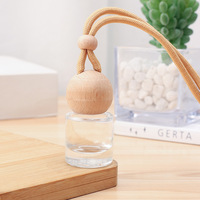 Conception de luxe vide 8ml forme ronde bouteille de parfum de voiture désodorisant de voiture suspendu pour diffuseur de parfum d'huiles essentielles