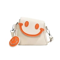 Sac à bandoulière en cuir PU tendance 2025, imperméable, avec fermeture éclair et doublure en polyester, motif visage souriant mignon pour femmes