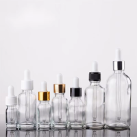 Flacon compte-gouttes en verre transparent de 30 ml, directement de l'usine, avec emballage en boîte sérigraphiée pour huiles essentielles, parfums, sérums cosmétiques