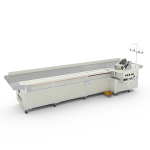 Máquina de coser industrial de cama plana de cinco hilos de alto rendimiento con alimentación automática, cabezal motorizado para empalme de cortinas y puntada de seguridad. - Product Image 1
