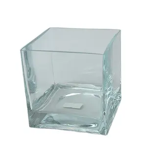Venta al por mayor de jarrón de cristal en forma de corazón para la decoración del hogar, jarrón de cristal soplado a máquina barato, maceta transparente