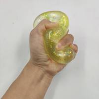 Jouet anti-stress souple et extensible en TPR en forme de banane scintillante, pour adultes unisexe CZ