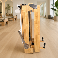 Reformer de Pilates compact, portable et pliable en bois de chêne avec pieds en bois pour la pratique à domicile, les cours en studio et la salle de sport d'hôtel