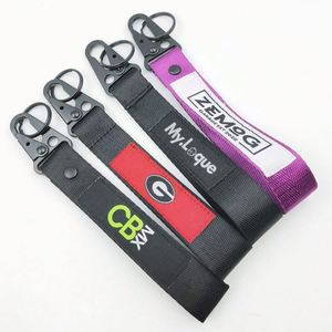 Llavero promocional personalizado con logo bordado negro, para motocicleta, aviación, escalada, con mosquetón y etiquetas de nailon. - Product Image 1