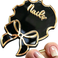 Présentoir à ongles en acrylique avec bordure dorée et nœud papillon, multicolore, pour manucure, accessoire photo pour selfies, support de prise de vue pour nail art, pour usage en salon de manucure