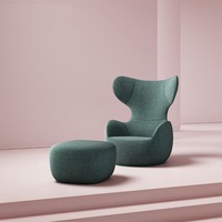 Fauteuil lounge moderne à dossier haut avec base pivotante pour hall d'hôtel et réception