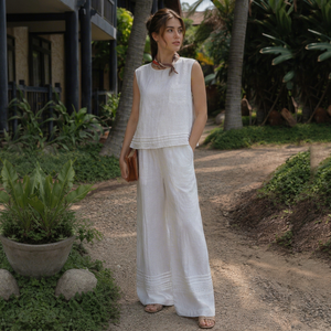 Tenues d'été décontractées chic et modernes pour femmes - Ensemble 2 pièces blanc sans manches, débardeur ample et pantalon large respirant - Fournisseur en gros - Product Image 1