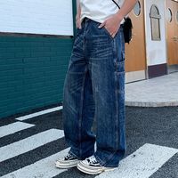 Jean en denim bleu délavé style rétro, coupe droite, ample et décontracté, polyvalent et tendance