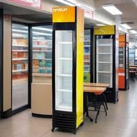 Réfrigérateur vitrine vertical 150L au design mince avec porte vitrée et éclairage de marque intégré