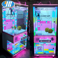 Machine de jeu à monnayeur de luxe, entièrement transparente, type grue à pinces pour poupées et bonbons, pour parcs et clubs de jeux roses