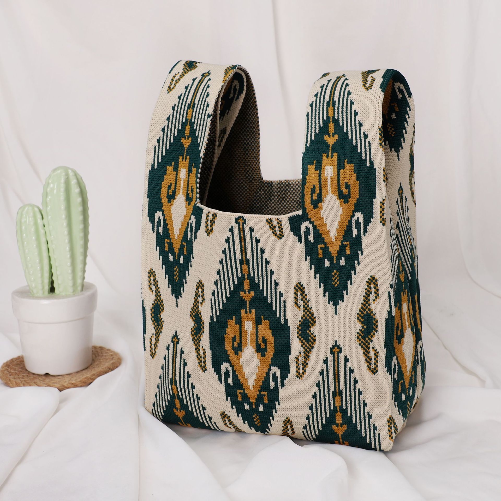 Petit sac à motif de flèches à losanges - vert foncé et beige