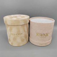 Boîte cadeau ronde en carton recyclé avec logo personnalisé en feuille d'or et pelliculage brillant