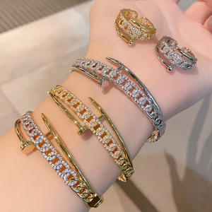 Ensemble de bracelet et bague de luxe pour ongles, or et argent bicolore, incrusté de diamants, bijoux de mode, cadeau pour femme, printemps 2025 - Product Image 1