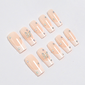 <span class=keywords><strong>Faux</strong></span> ongles élégants papillon French Manucure 24 pièces, longs carrés nude, en ABS avec strass, réutilisables avec colle, cadeau pour mariée ou rendez-vous - Product Image 1