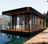 Maison flottante préfabriquée modulaire de luxe en acier léger, villa mobile, salle de bain, atelier pour les escapades en bord de lac et en montagne