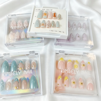 Vente en gros de faux ongles personnalisés à étiquette privée, en amande, avec des motifs variés, finition brillante, ensemble de faux ongles