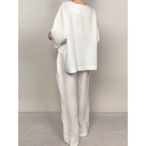 Femmes décontracté couleur unie <span class=keywords><strong>grande</strong></span> <span class=keywords><strong>taille</strong></span> irrégulière trois quarts manches col en v haut pantalon coton 2 pièces <span class=keywords><strong>ensemble</strong></span> mode - Product Image 5