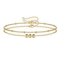 Bracelet double couche coulissant en acier inoxydable pour femme, avec perles en acier inoxydable et trois perles dorées, en or 18 carats inaltérable