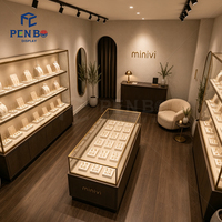 Vitrine de présentation de bijoux de luxe en bois foncé avec finition dorée, éclairée par LED, en verre trempé, pour boutique de bijoux et vente au détail