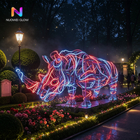 Sculpture lumineuse en forme de rhinocéros en fer, changeant de couleur en 3D, NUOWEI GLOW, pour les parcs à thème en plein air, les zoos, les décorations de Noël et les décorations scéniques