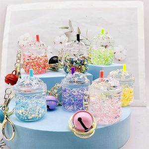 Porte-clés créatifs porte-bonheur : Bouteille de sable mouvant liquide lumineuse, Porte-clés pour sac, Pendentif de voiture, Tasse iceberg, Cadeaux adorables - Product Image 1