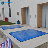Plateforme élévatrice à ciseaux fixe robuste avec capacité de 1 à 20 tonnes, table de 1200x1200 mm pour le transfert de marchandises
