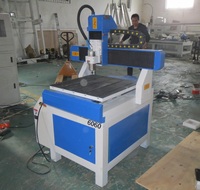 Machine de gravure et de fraisage CNC 4 axes d'occasion ATC 6060 1.5KW Mach3 à haute rigidité pour le travail du bois avec changeur d'outils automatique et pompe