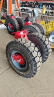 Roues pivotantes super robustes de 6 tonnes, 9 tonnes, 20 tonnes, pneus en caoutchouc, conteneur d'expédition ISO, roulettes pour terrains accidentés