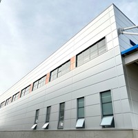 Bâtiment en structure métallique avec revêtement ignifuge - Entrepôt préfabriqué de sécurité supérieure pour zones à haut risque