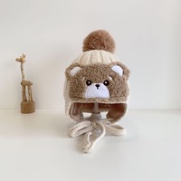 Bonnet tricoté épais et chaud pour enfant, nouveau style, motif ours mignon avec double pompon en peluche, idéal pour l'hiver froid – Fournisseur direct usine