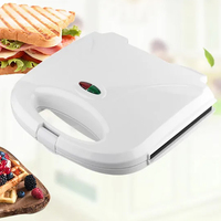 Machine à sandwich à 2 tranches pour la cuisson des sandwichs, des gaufres et des paninis électriques.