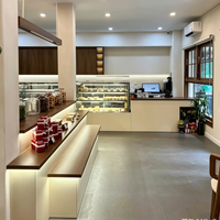 Vitrines de présentation haut de gamme sur mesure pour les magasins de détail, adaptées à la décoration intérieure des cafés
