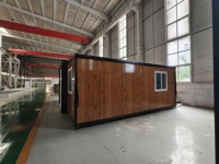 Maison pliable à double aile