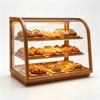 Vitrine de boulangerie haut de gamme en verre avec cadre métallique argenté arqué, éclairage LED multifonctionnel, comptoir de présentation de luxe