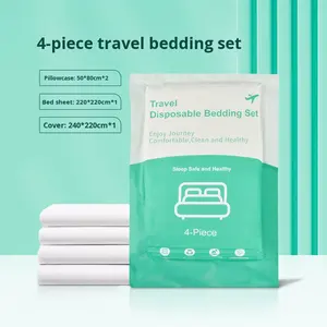 Ensemble de voyage d'hôtel jetable de quatre pièces 200TC drap de lit en coton housse de couette taie d'oreiller serviette de bain-techniques non tissées solides - Product Image 1