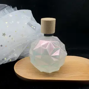 クラウンキャップ付き50ml不規則な形の丸いカラフルなミラージュガラス香水瓶