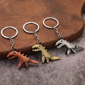 Porte-clés <span class=keywords><strong>dinosaure</strong></span> en métal en gros, porte-clés <span class=keywords><strong>dinosaure</strong></span> réaliste style Jurassic, mousqueton de dessin animé vintage tendance - Product Image 1