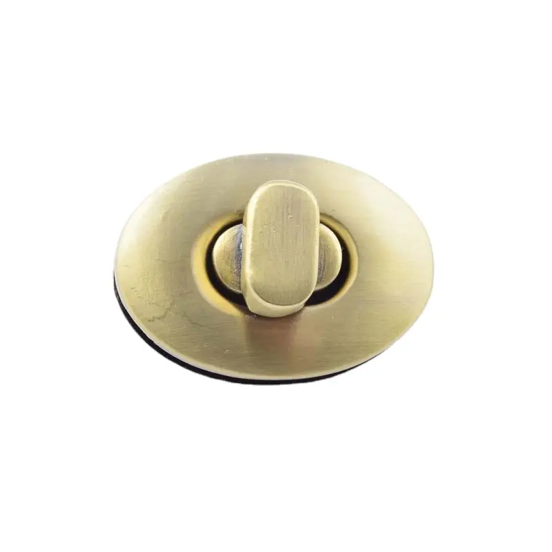 hot selling customized interesting lock light gold plating oval shape turning lock for handbags