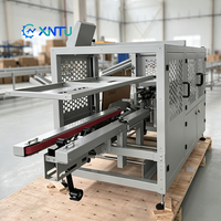 Machine automatique à grande vitesse pour l'érection de cartons et la formation de boîtes, pour l'exécution des commandes e-commerce, l'emballage alimentaire et de boissons, haute productivité